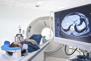 Image of man receiving Computed Tomography (CT) scan