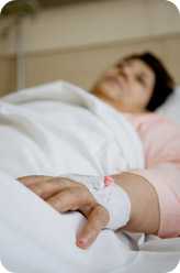 Woman in hospital bed