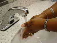 person washing hands