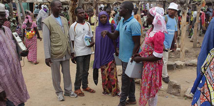 Villagers in Cameroon working with World Health Organization to distribute cholera vaccine