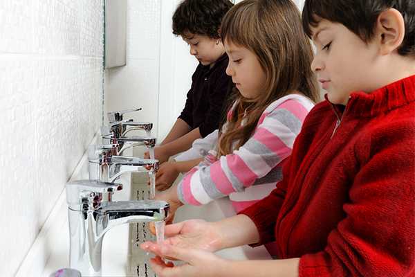 Children washing hands