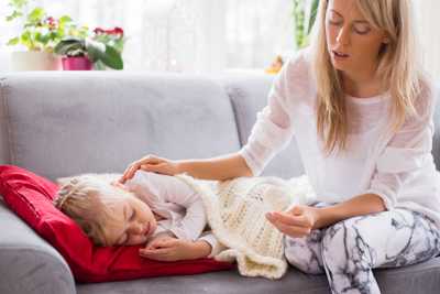 Image of woman caring for a child - Link to Recent Work