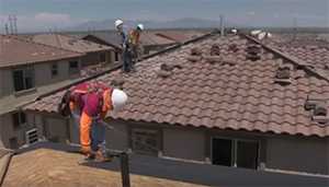 Man on a roof