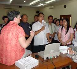 A physician participates in the practicum session of spirometry training.