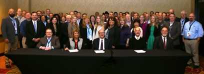 	Seated in the front of this photo are from left to right Jerry Jacobs and Joyce Ryel, Industry representatives of the STEPS Network; Dr. David Michaels, Asst. Secretary of Labor for OSHA; Dr. John Howard, NIOSH Director; Rick Ingram, National STEPS Network Founder. Behind the signatories are representatives of all three alliance member organizations present at the signing.