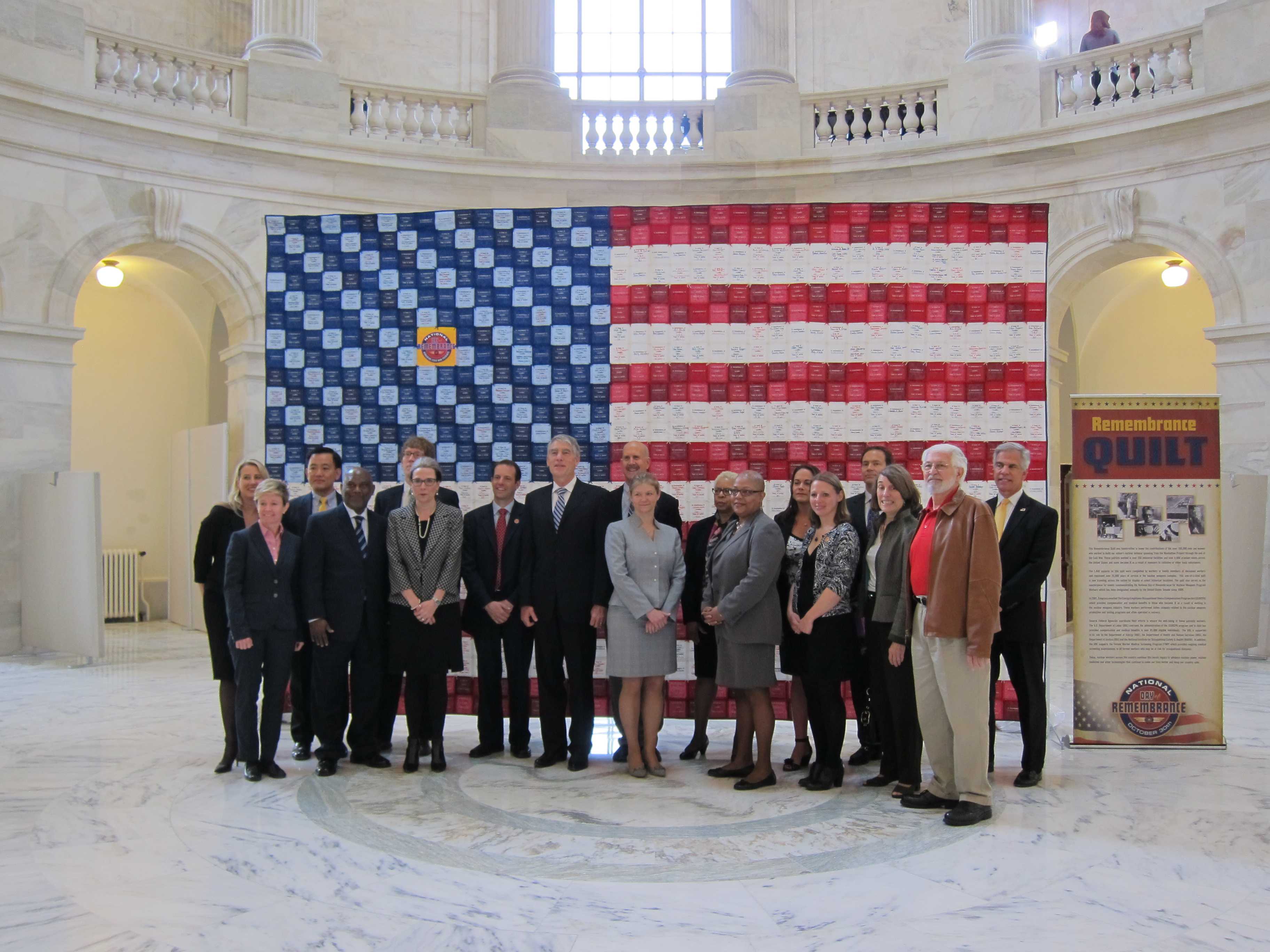 Federal agency representatives, including Dr. Howard, alongside Senator Mark Udall