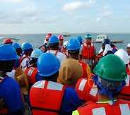 a group of people monitoring the area