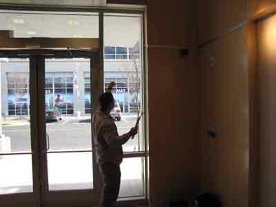 man standing in front of window