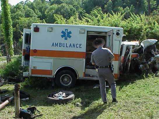 Driver's cab and patient compartment.  Note minimal damage to compartment.