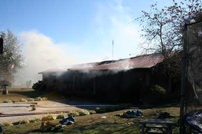 smoke coming from roof of house