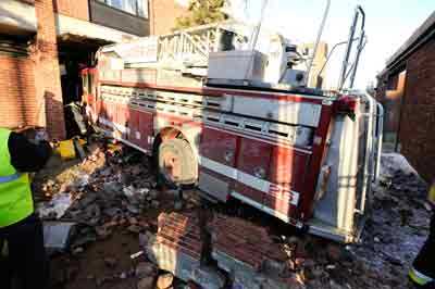 Fire truck after crashing into building