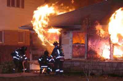 flames shooting from a door.