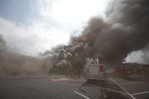 Wind pushing smoke away from building