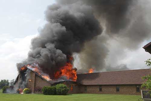 Heavy smoking rolling from church