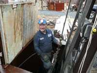 Coal miner emerging from his coal mine in Eastern PA.