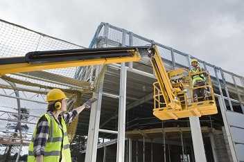 	man In Yellow Crane Lift