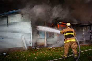 	Fireman put out building fire