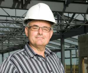 	Older miner in hard hat