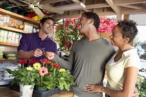 Couple talking to florist