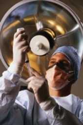 health care worker handling syringe