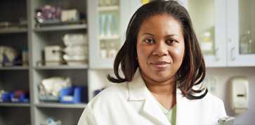 lab woman with clipboard