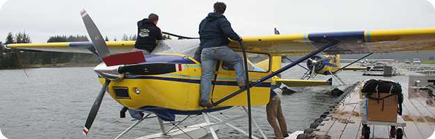 	Workers load and fuel a Cessna 180 in Juneau, Alaska.