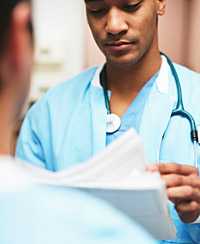 	Health care manager reviewing a document