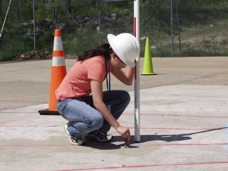 Observer marking points on polar grid.