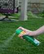 	Personal insect repellant being sprayed outside