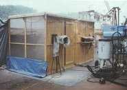 	worker doing silica sand blasting