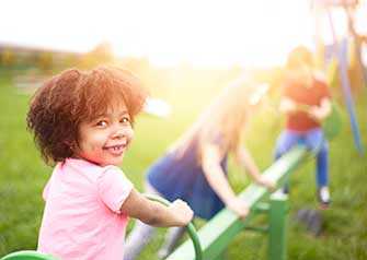 	Children playing on a see-saw