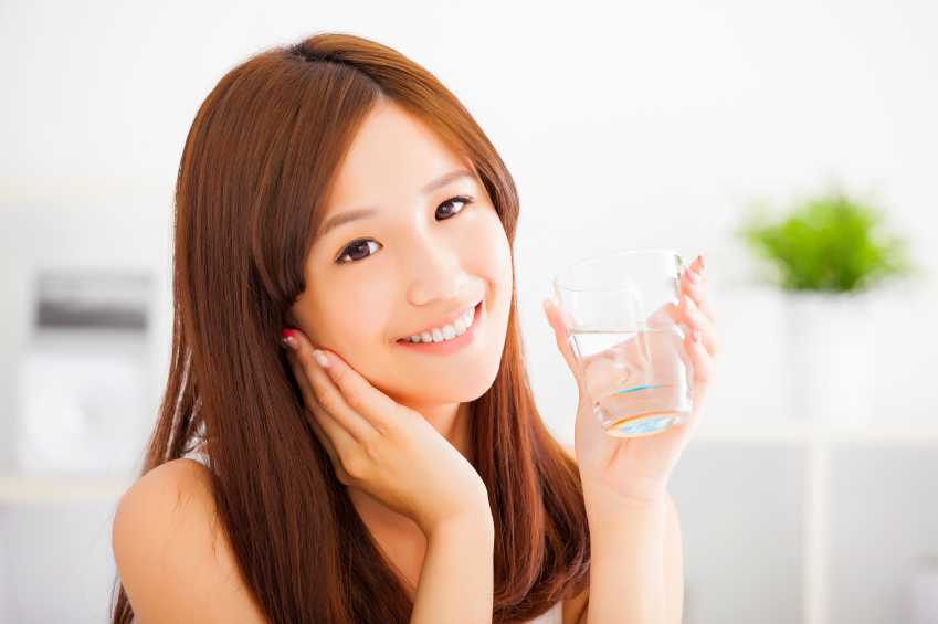 Young female with healthy teeth and bright smile