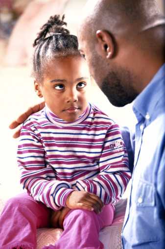 Dad talking to tddler daughter