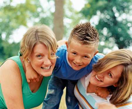 Mom, son, and grandmother playing