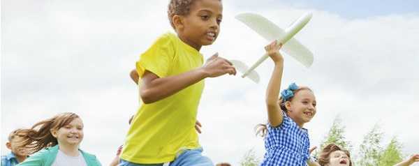 Image of children running in a field