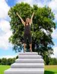 Woman at top of stairs