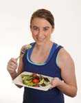 Woman eating a salad