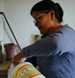 woman mixing bleach and water