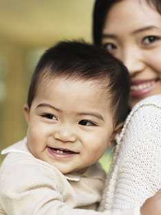 Mother and child smiling