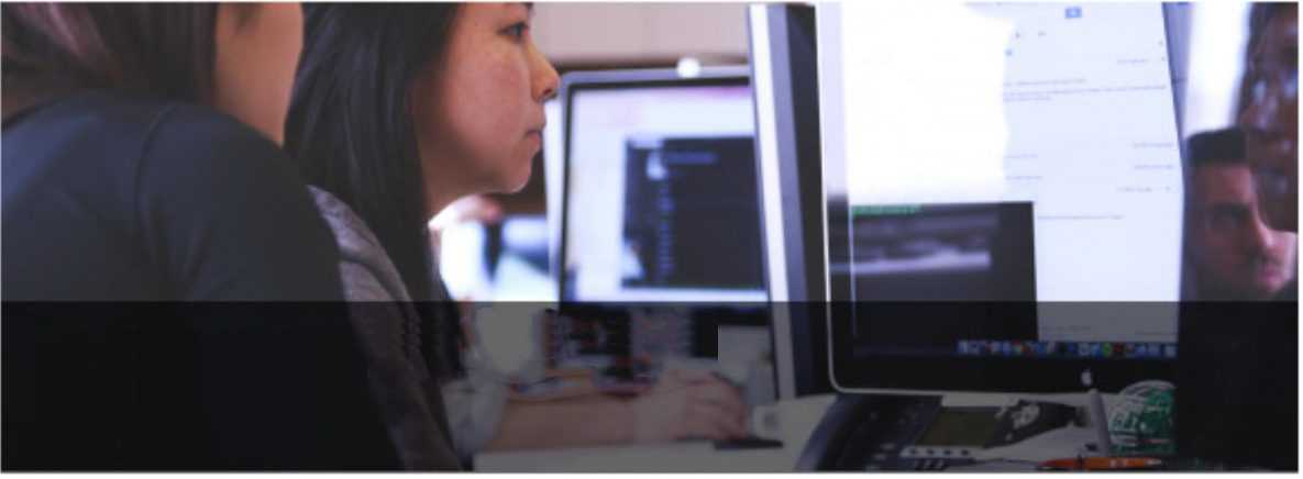 Women sitting in a computer environment