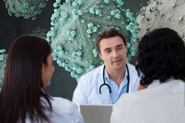 couple talking to doctor