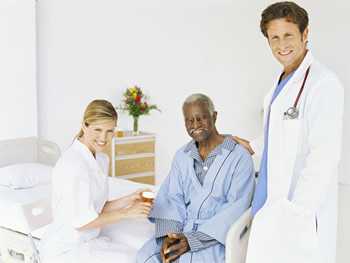 	Photo: Doctor and nurse with older adult male patient