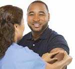 Smiling patient with nurse.