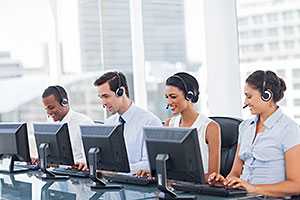 tech support team sitting in front of computers