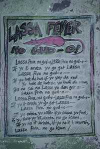 sign reading Lassa Fever no gud-o! Lassa fiva no gud-0, lassa fiva no gud-o if yu it arata yu go get lassa lassa fiva no gud-o if yu trot de hut if yu yay de red yu bak de hut en yu don get so lassa fiva no gud o lassa fiva no gud o