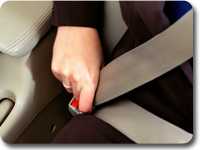 Photo: Fastening a seatbelt.